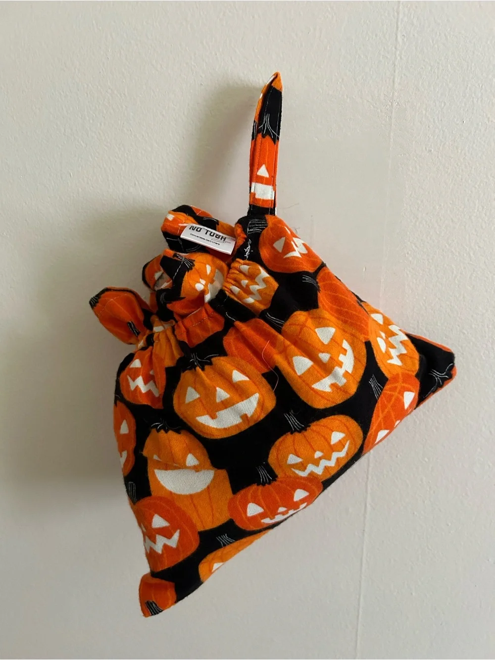 Pumpkin glow in the dark costume shopping cart liner with matching handbag